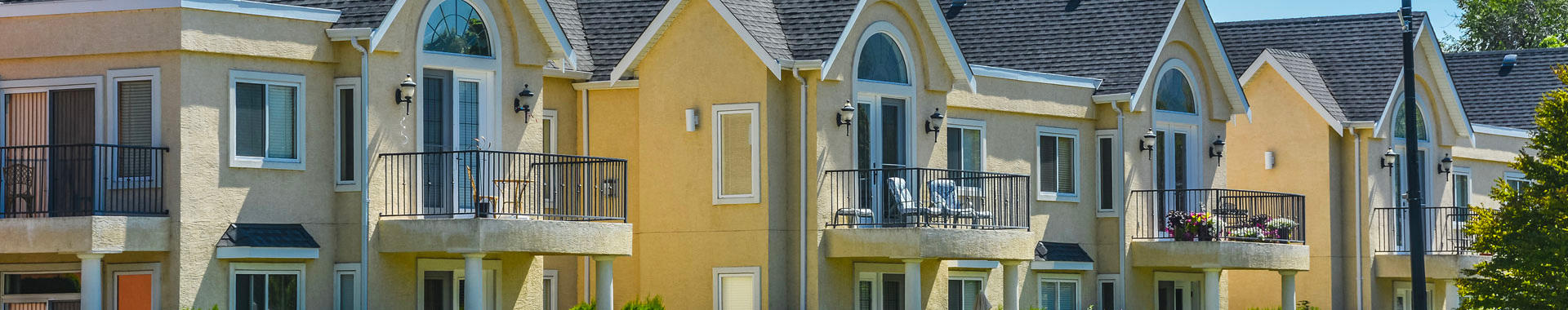 Residential street with brick homes.
