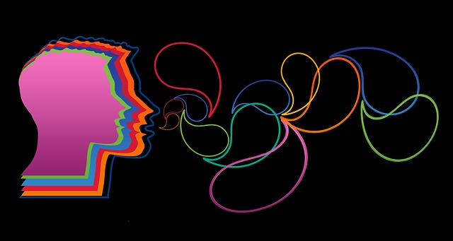 Colorful speech bubbles flow from a layered head silhouette.