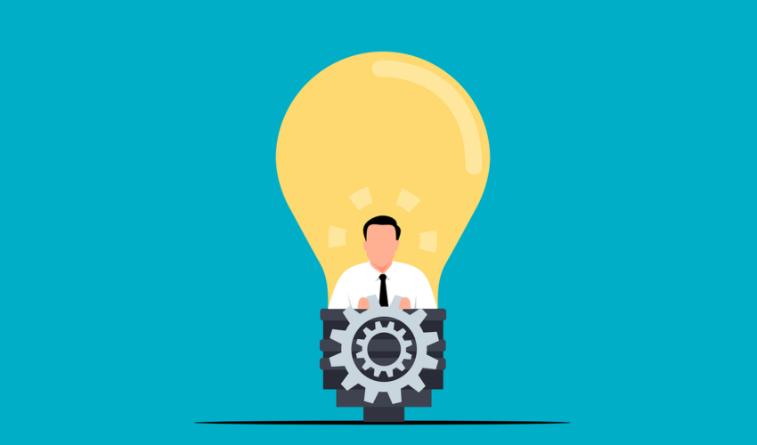 Person inside a light bulb with gears, symbolizing a new idea.