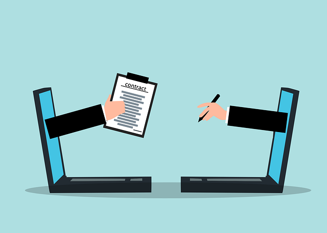Digital contract signing illustration with cartoon hands and laptops.